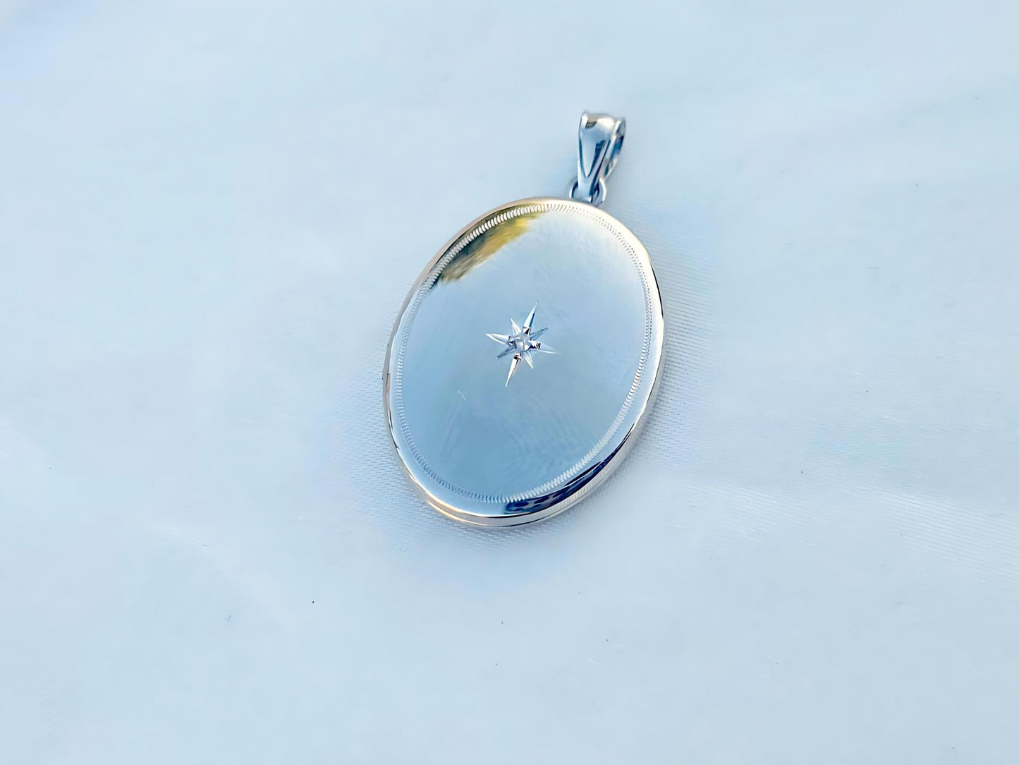 925 Sterling Silver Oval Locket Pendant with Diamond Starburst Set Etched Border